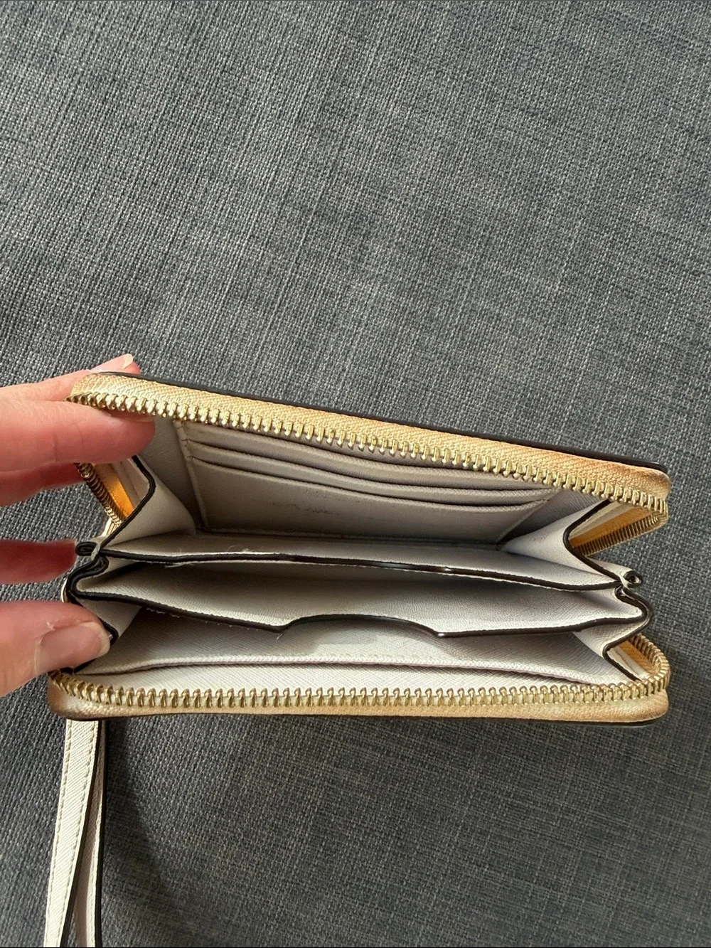 Michael Kors Cream Zip Wristlet with Gold Plaque